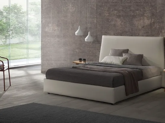 Letto con testiera leggermente curva in essenza easy Noce di Filesse di Caccaro